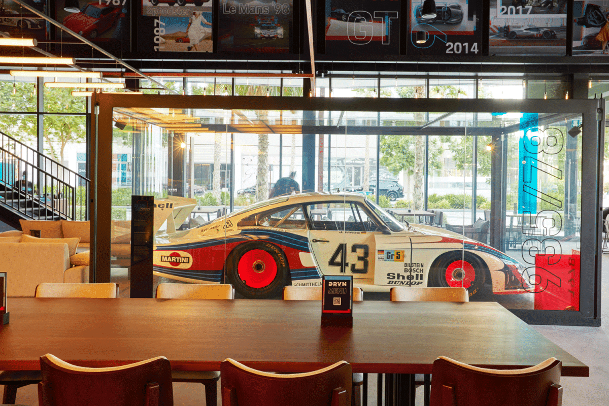 First look: New Dubai cafe stocked with $100 million worth of Porsches -  Caterer Middle East