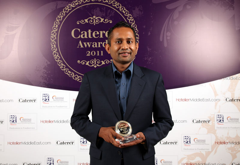 Mohan Raja Pakse, F&B Manager C-Taste Restaurant accepts the award for Pheang Nary Mohan Raja Pakse, F&B Manager C-Taste Restaurant accepts the award for Pheang Nary