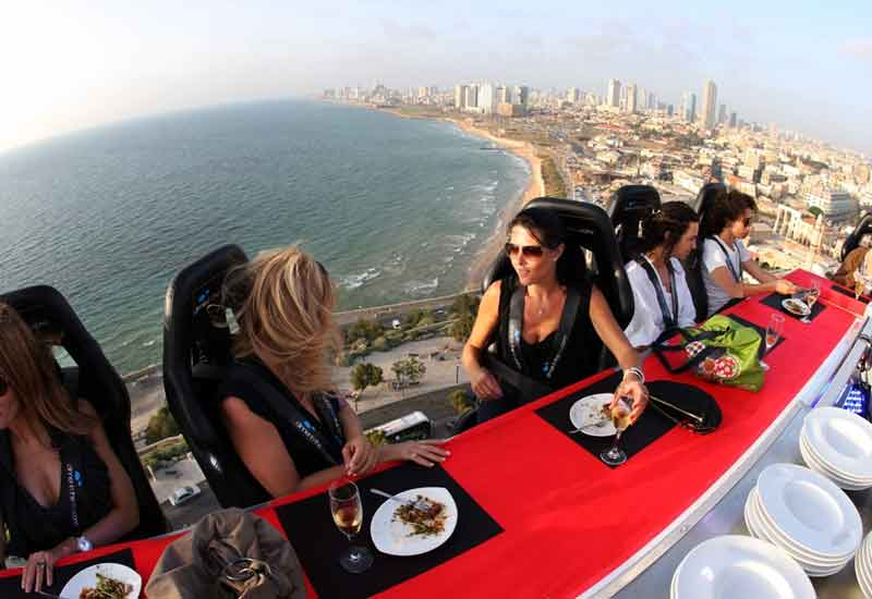 Dinner in the Sky, above Jumeirah Beach in Dubai. Dinner in the Sky, above Jumeirah Beach in Dubai.