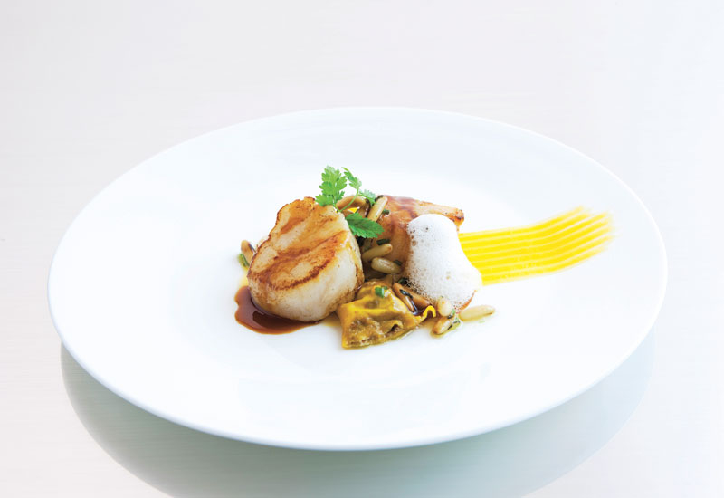 Pan-seared scallops. Pan-seared scallops.